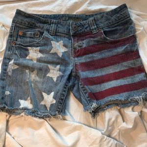 American Eagle American flag cutoff shorts